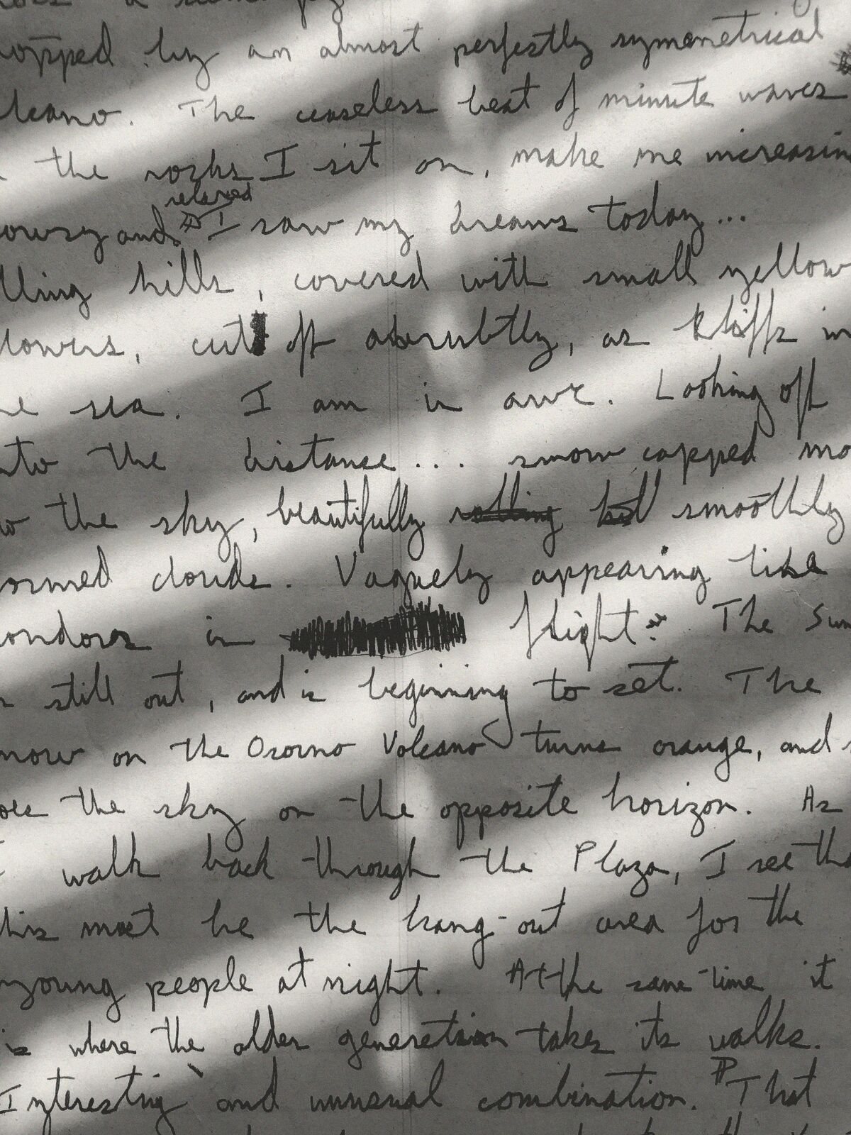 A handwritten page in slanting light.